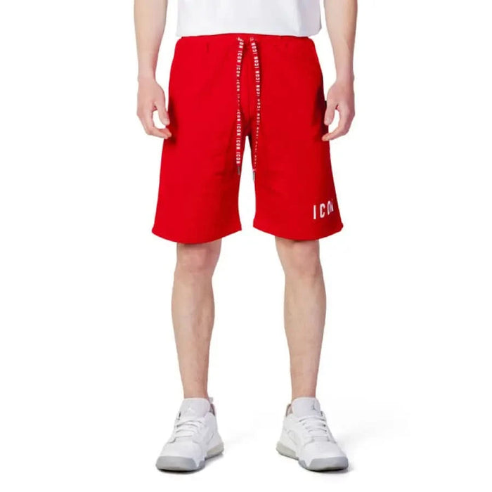 Man in red Icon-Icon shorts and white t-shirt showcasing urban city style clothing