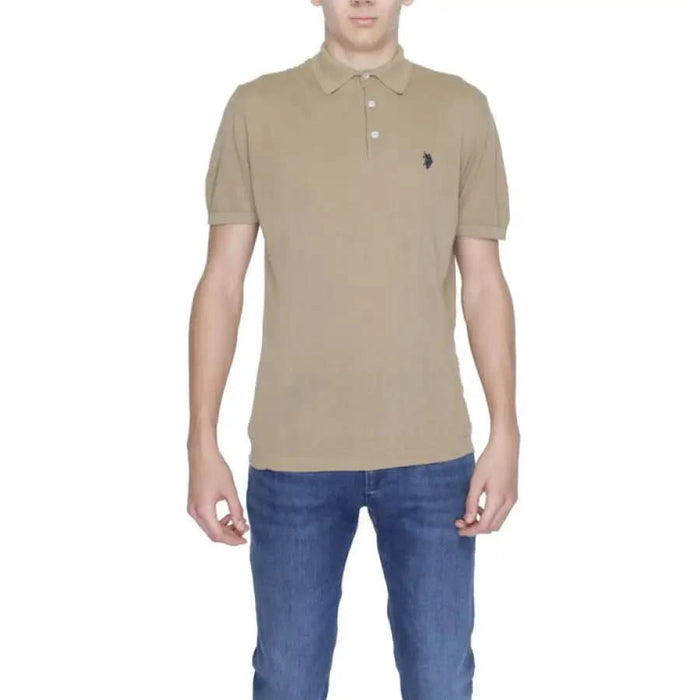 Man wearing U.S. Polo Assn. tan polo shirt, part of the U.S. Polo Assn. Men Polo collection