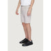 Man wearing Alviero Martini Prima Classe white t-shirt and shorts, casual summer outfit