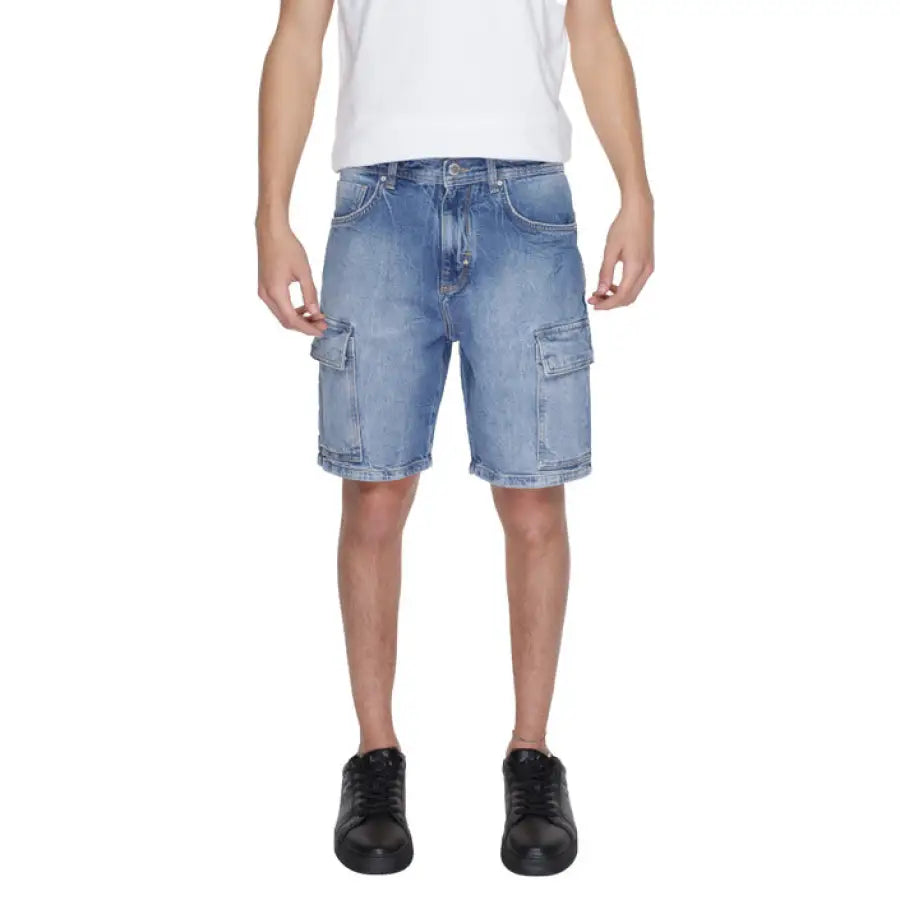 Man in white T-shirt and blue denim shorts from Antony Morato Men Shorts collection