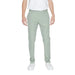 Man wearing Antony Morato white t-shirt and green urban trousers