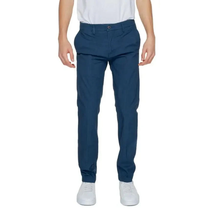 Urban style clothing - Man in white T-shirt and Borghese Men Trousers (blue pants)