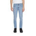 Man in white shirt wearing Boss Men Jeans for urban city style fashion