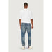 Man in white t-shirt and blue jeans from behind, showcasing Only & Sons Men Jeans