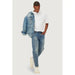 Man in white t-shirt and blue jeans with denim jacket from Only & Sons Men Jeans