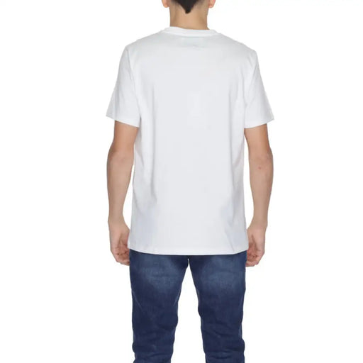 Urban style: Man wearing Underclub Men T-Shirt, white tee & jeans, casual men’s clothing