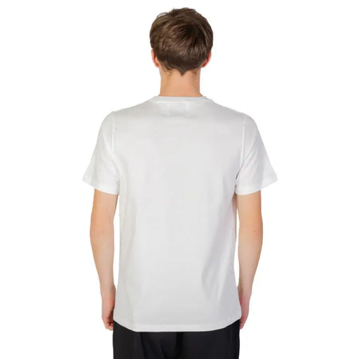 Urban style man wearing Underclub men T-shirt with black logo on the back