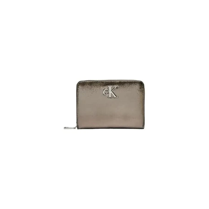 Metallic bronze Calvin Klein zip-around wallet featuring CK logo in Calvin Klein Jeans collection