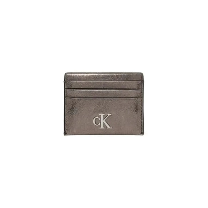 Metallic pewter Calvin Klein card holder featuring CK logo in Calvin Klein Jeans wallet