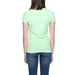 Armani Exchange Women’s T-Shirt: Mint green, short-sleeved, paired with blue jeans, back view