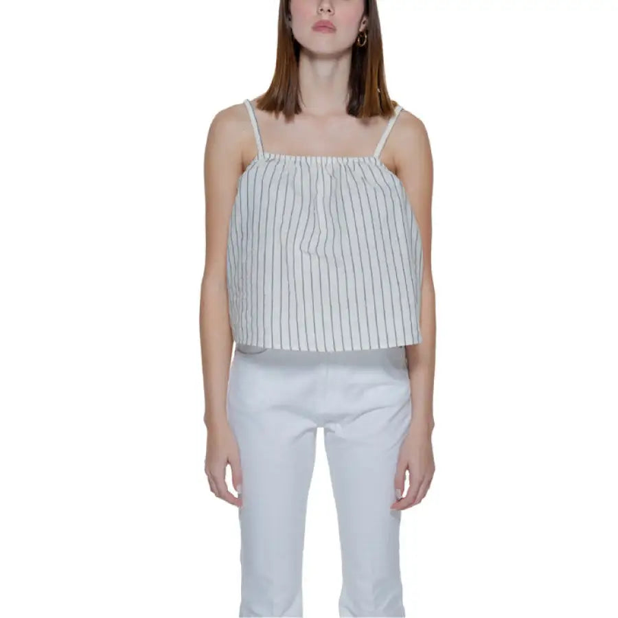 
                      
                        Vero Moda urban style clothing model in white and black striped top
                      
                    