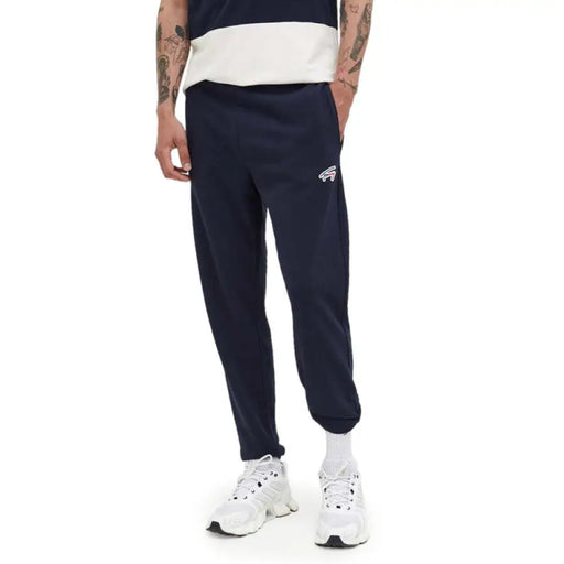 Navy blue athletic sweatpants with elastic cuffs from Tommy Hilfiger Jeans for men