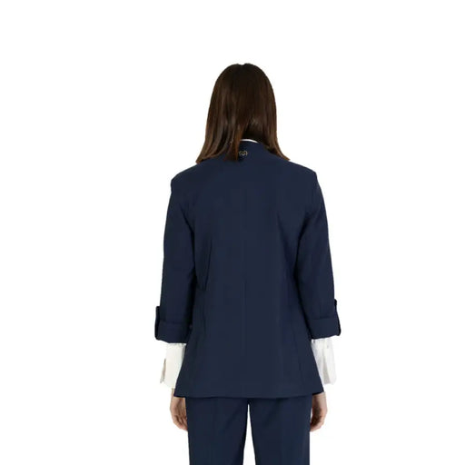 Navy blue blazer with rolled sleeves and white cuffs from the back, by Rinascimento