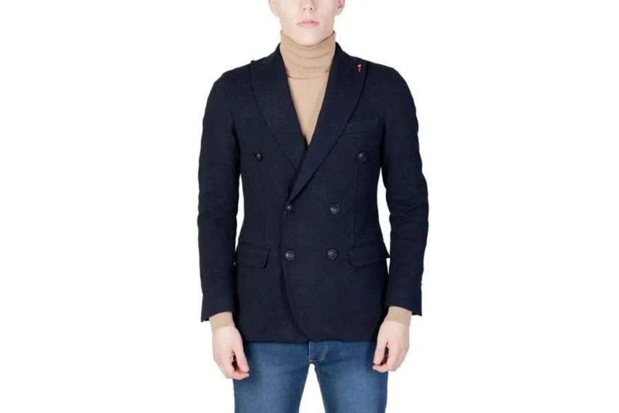 Navy blue double-breasted blazer with peaked lapels featured in Men’s Capsule Wardrobe Guide.