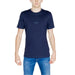 Navy blue Guess Men T-Shirt worn with blue jeans, fashionable and casual attire