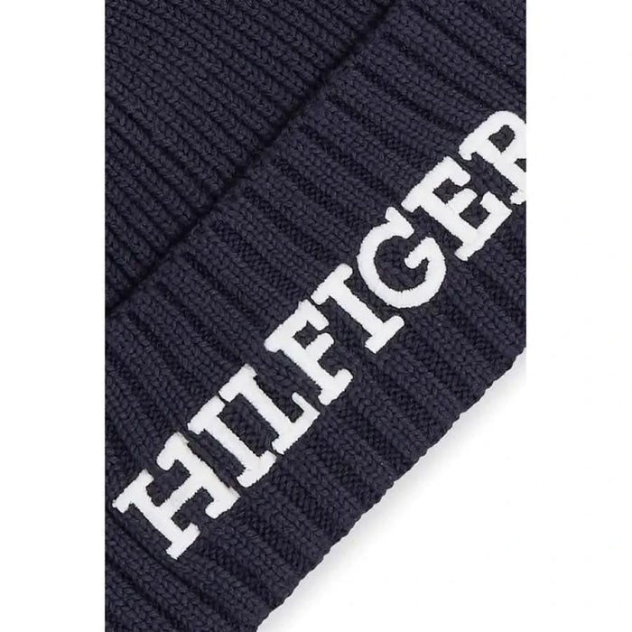 Navy blue knit beanie with Hilfiger text embroidered in white for men by Tommy Hilfiger