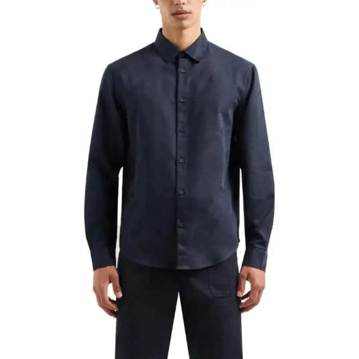 Navy blue long-sleeved button-up shirt worn by a model from Armani Exchange Men