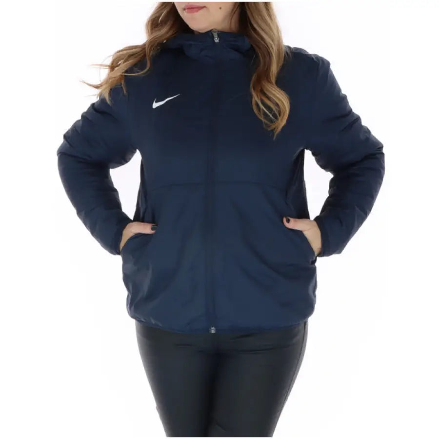 Navy blue Nike zip-up hooded jacket worn by long blonde-haired woman - Nike Women’s Jacket