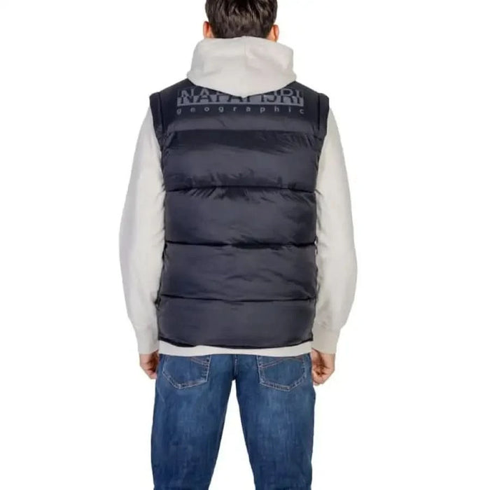 Navy blue puffy vest over light gray sweater from Napapijri Men Jacket collection