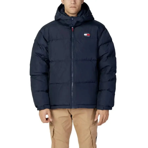 Navy blue puffy winter jacket with hood and zipper from Tommy Hilfiger Jeans