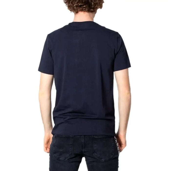 Armani Exchange Men T-Shirt in Navy Blue worn by person, rear view, short-sleeved design