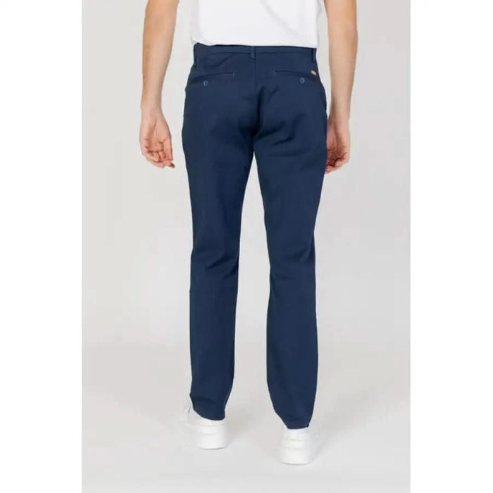 Navy blue straight-leg trousers worn by a model Armani Exchange Men Trousers