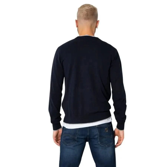 Navy blue sweater over white undershirt from Armani Exchange Men Knitwear collection