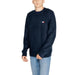 Navy blue Tommy Hilfiger men’s sweater with logo patch on chest in knitwear style