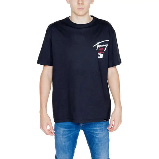 Navy blue Tommy Hilfiger Jeans men t-shirt with small chest logo on white background