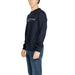 Navy blue Tommy Hilfiger sweatshirt on a person in Tommy Hilfiger Men Sweatshirts collection