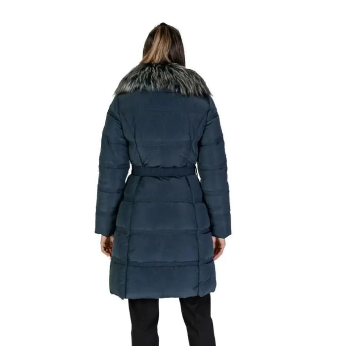 Navy blue winter puffer coat with fur-trimmed collar viewed from the back by Guess