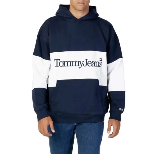 Navy and white Tommy Jeans hoodie with color-blocked design and logo across the chest