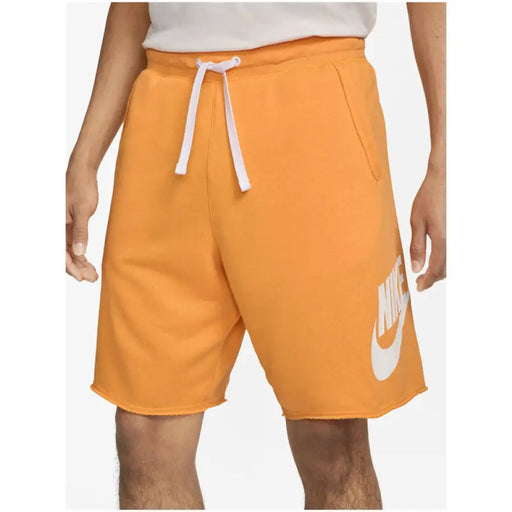 Orange Nike athletic shorts with white drawstring and logo displayed in Nike Men Shorts collection