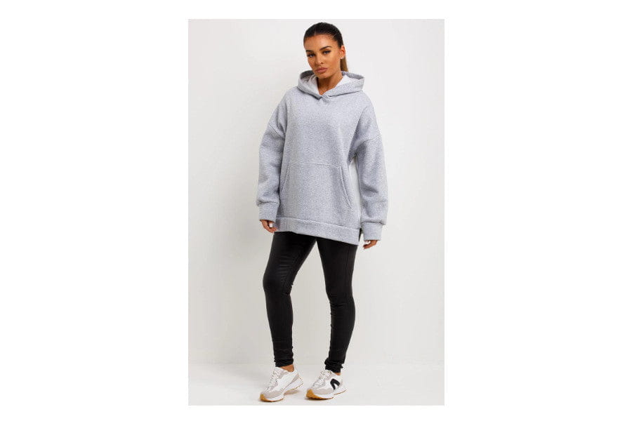 Oversized light gray hoodie sweatshirt for minimalist outfits in everyday wear.