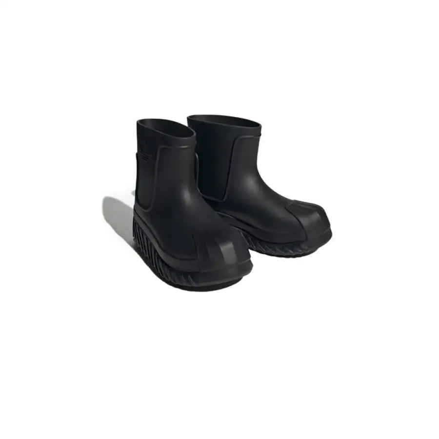 Adidas Women Boots - Pair of black rubber ankle boots with textured soles