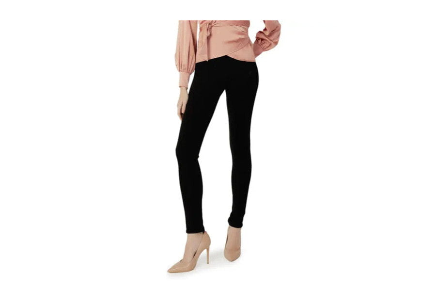 Pair of black skinny jeans exemplifying old money style for an elegance look.