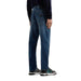 Pair of blue denim jeans worn by a person featuring Armani Exchange Men Jeans