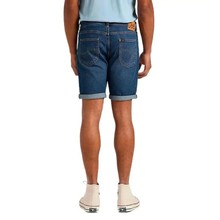 Man in blue denim shorts with rolled-up cuffs, Lee Men Shorts