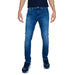 Blue denim jeans worn by a person, featured in Tommy Hilfiger Men’s Jeans collection