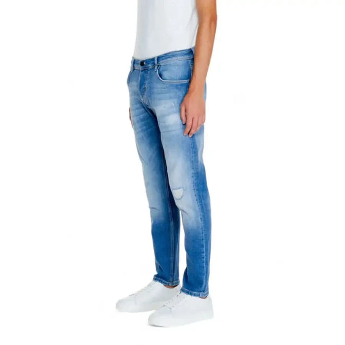 Light blue denim jeans worn by a person featuring Antony Morato design