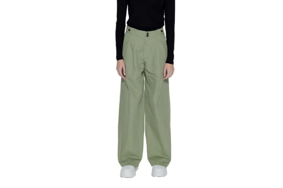 Light green wide-leg trousers, a stylish outfit for your holiday capsule wardrobe.