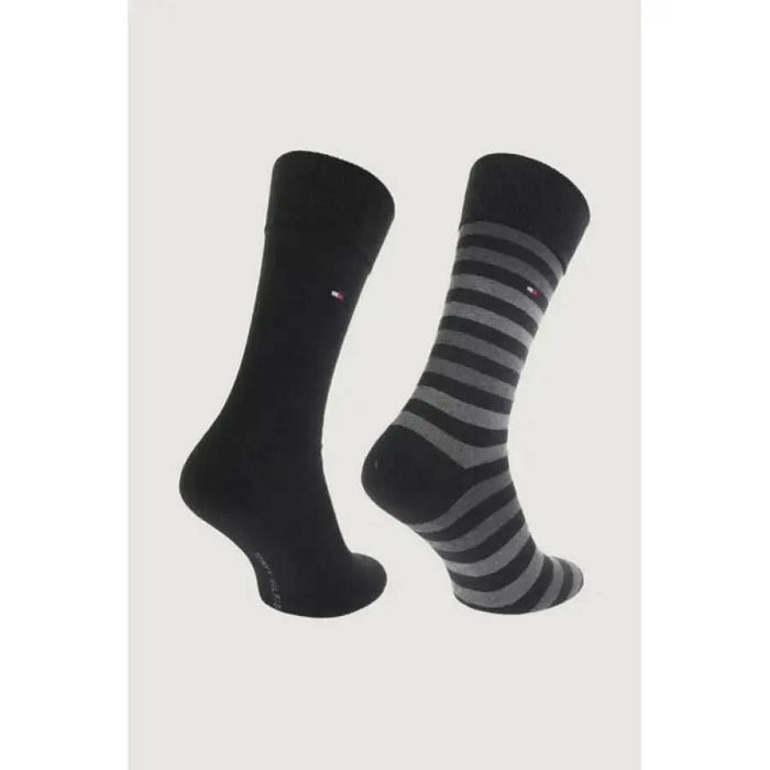 Pair of men’s dress socks, one solid black and one with gray stripes - Tommy Hilfiger