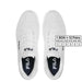 Pair of white Fila sneakers featuring perforated detailing and black inner soles