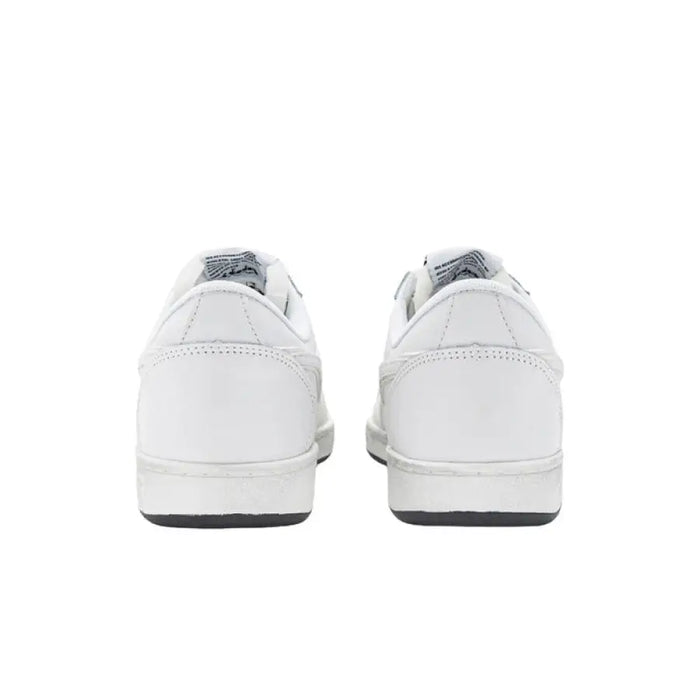 Pair of white low-top sneakers from behind featuring Diadora Men Sneakers design