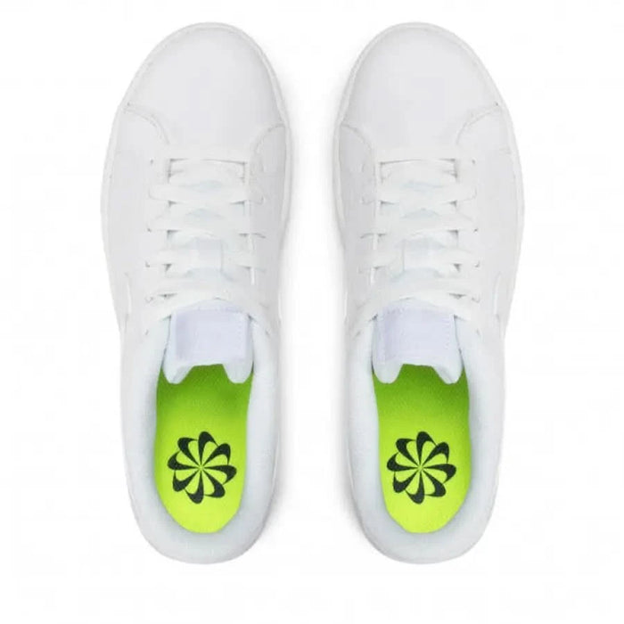 Nike Women Sneakers: White sneakers with green insoles and black floral design