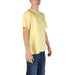 Pale yellow Boss Men T-Shirt paired with blue jeans for a stylish casual look