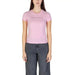 Pink Tommy Jeans t-shirt with gray denim pants from Tommy Hilfiger Jeans collection