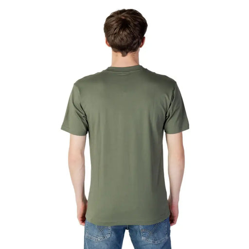 Back view of a plain olive green New Balance Men T-Shirt showcasing its design