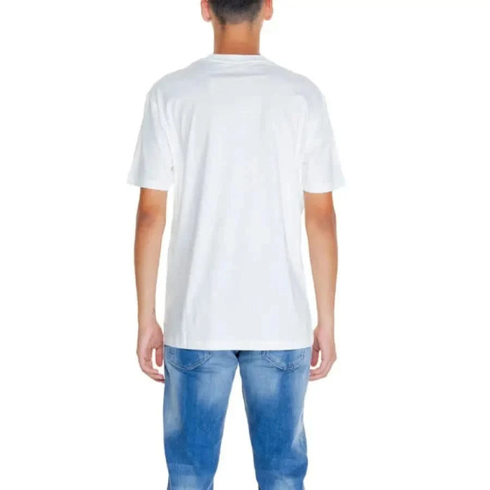 Plain white t-shirt worn with blue jeans, featured in Armani Exchange Men collection