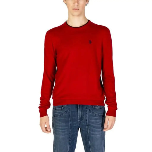 Red crew neck sweater featuring a dark logo, part of U.S. Polo Assn. men’s knitwear